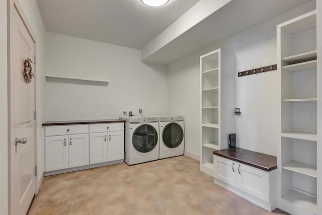 5010 Jeff Dr, Missoula, MT 59803 - washroom with cabinet space and washing machine and dryer
