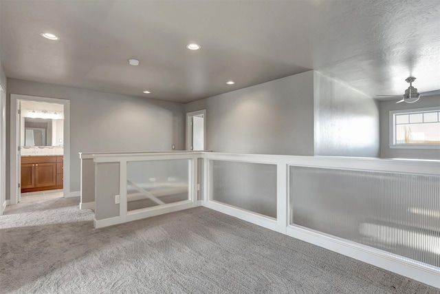 5010 Jeff Dr, Missoula, MT 59803 - unfurnished room with light colored carpet, recessed lighting, baseboards, and ceiling fan