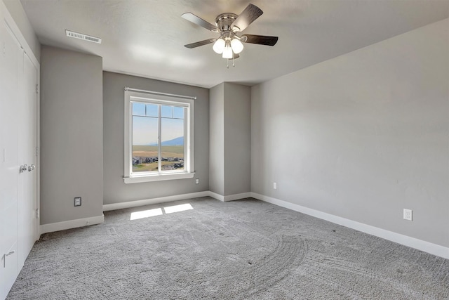 5010 Jeff Dr, Missoula, MT 59803 - carpeted spare room with a ceiling fan, baseboards, and visible vents