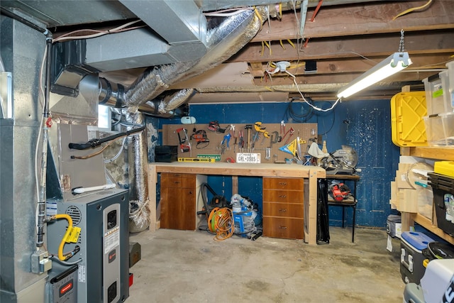 unfinished below grade area with a workshop area