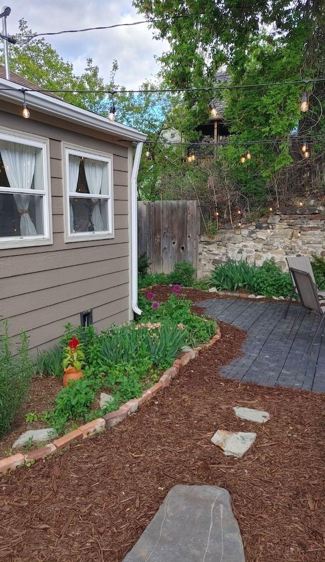 view of yard featuring a patio area and fence