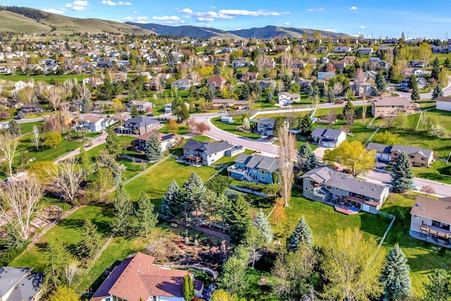 aerial view featuring a mountain view and a residential view