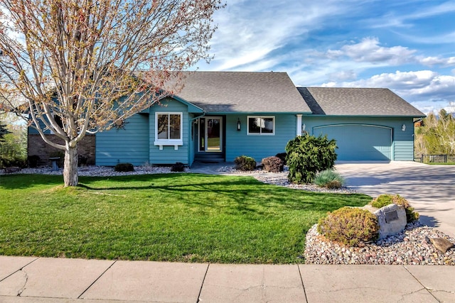 view of front of home featuring an attached garage, a front lawn, roof with shingles, and concrete driveway