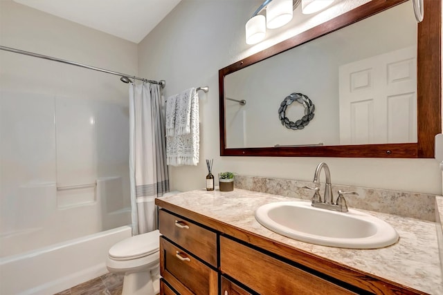 bathroom featuring vanity, shower / bath combo, and toilet