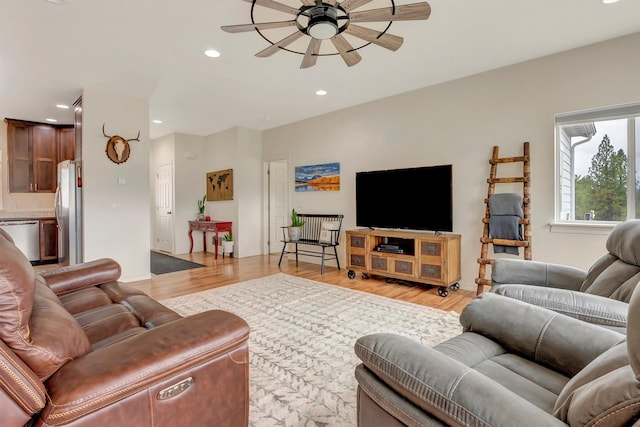 living room with recessed lighting, ceiling fan, and light wood finished floors