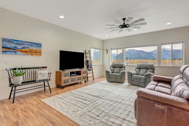 118 Rambling River Rd, Stevensville, MT 59870 - living area with a ceiling fan, light wood-style flooring, recessed lighting, and baseboards