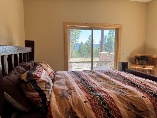 bedroom featuring access to outside