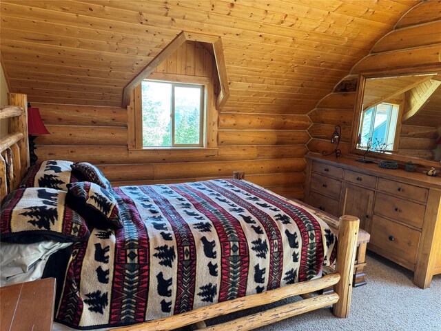550 Jackson Meadows Rd, Kila, MT 59920 - bedroom featuring log walls, wood ceiling, vaulted ceiling, and light carpet