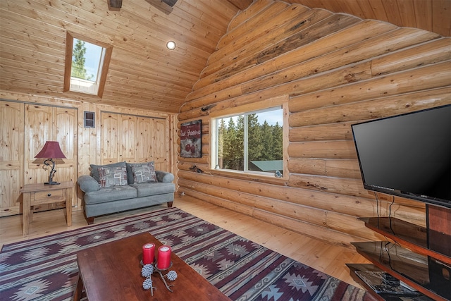 550 Jackson Meadows Rd, Kila, MT 59920 - living room featuring a skylight, wooden ceiling, high vaulted ceiling, and hardwood / wood-style floors