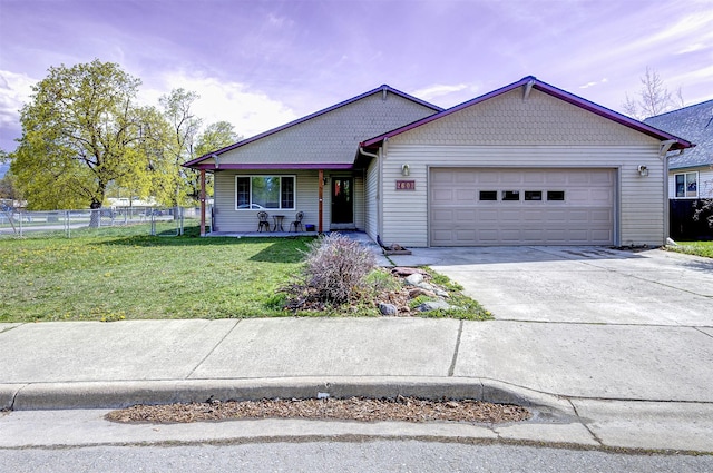 2603 Quinn Ct, Missoula, MT 59804 - single story home featuring a garage, a front lawn, fence, a porch, and driveway