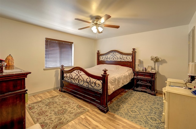 2603 Quinn Ct, Missoula, MT 59804 - bedroom featuring baseboards, ceiling fan, and wood finished floors