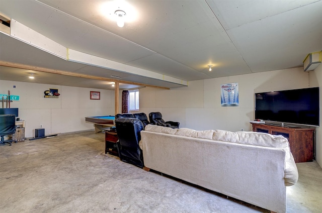 living room with billiards and concrete flooring