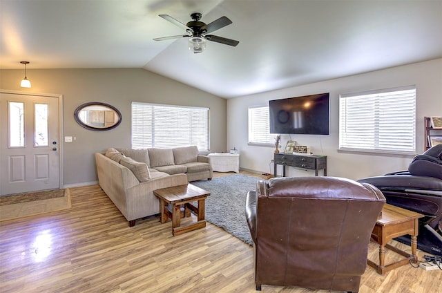 2603 Quinn Ct, Missoula, MT 59804 - living area with a ceiling fan, baseboards, lofted ceiling, and light wood-type flooring