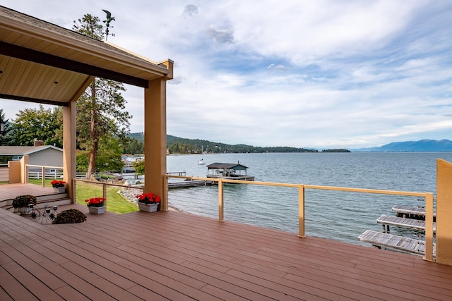 dock area featuring a water and mountain view