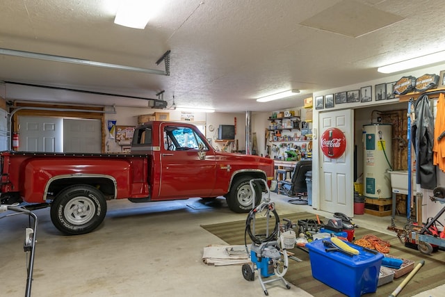 garage featuring a garage door opener and water heater