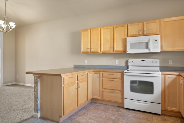 kitchen featuring an inviting chandelier, light brown cabinets, a peninsula, and white appliances