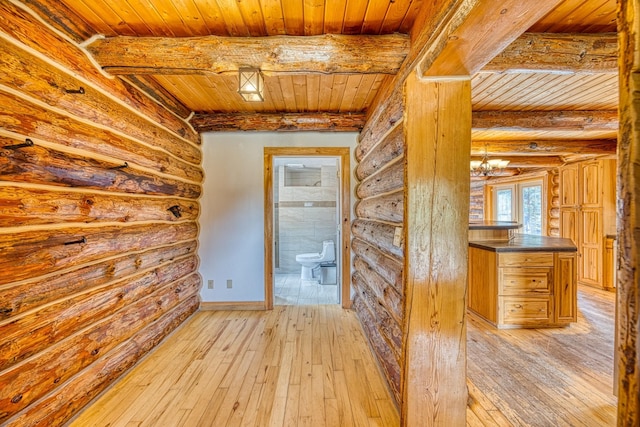 hallway with light wood finished floors, wood ceiling, log walls, and beam ceiling
