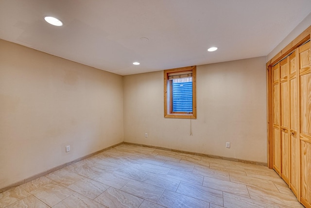 unfurnished bedroom featuring recessed lighting