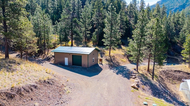 bird's eye view featuring a forest view