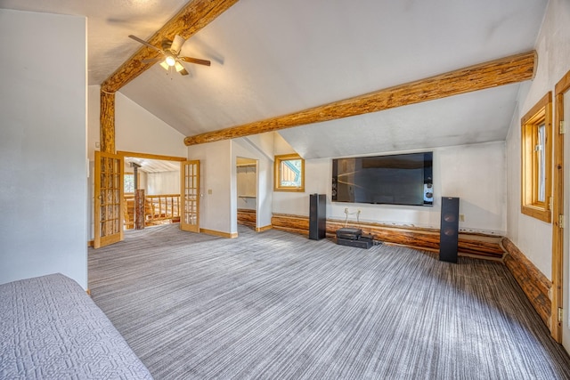 149 Novak Creek Ln, Cascade, MT 59421 - unfurnished living room featuring carpet flooring, ceiling fan, beam ceiling, high vaulted ceiling, and baseboards