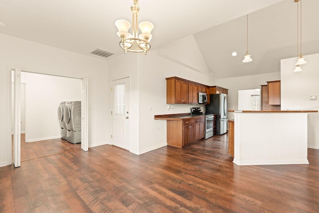 kitchen with brown cabinetry, an inviting chandelier, visible vents, separate washer and dryer, and stainless steel appliances