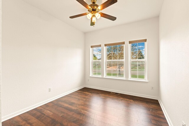 154 Palmer Dr, Kalispell, MT 59901 - spare room with baseboards, visible vents, ceiling fan, and dark wood finished floors