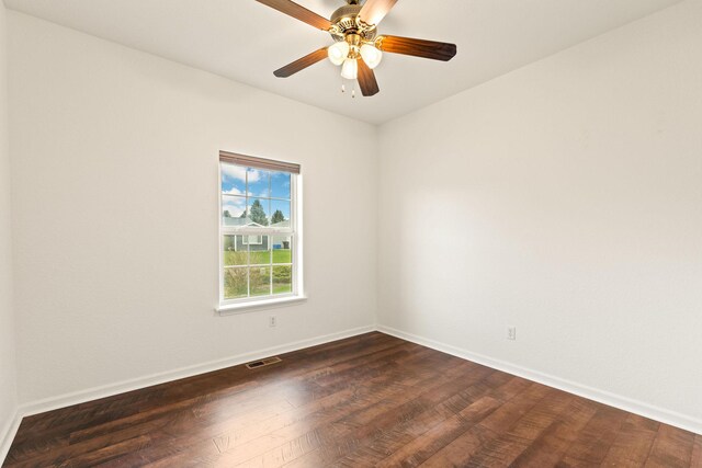 154 Palmer Dr, Kalispell, MT 59901 - unfurnished room featuring baseboards, ceiling fan, dark wood-type flooring, and visible vents