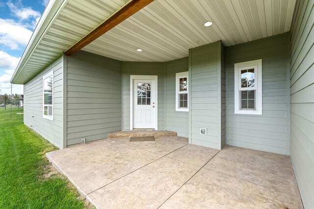 154 Palmer Dr, Kalispell, MT 59901 - view of exterior entry with a yard