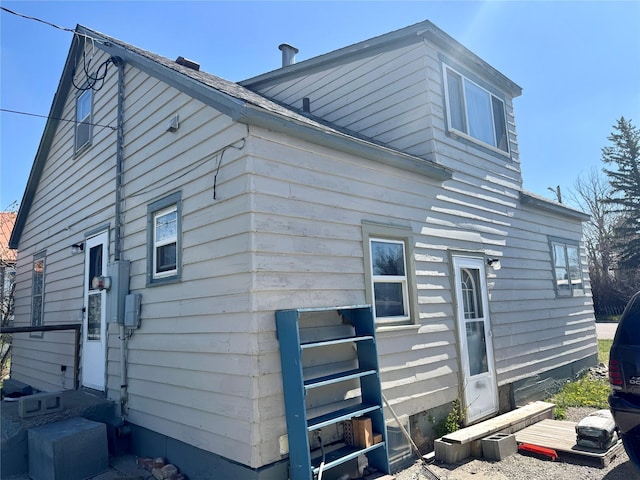 view of home's exterior with entry steps