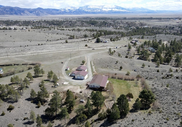 aerial view with a mountain view and a rural view