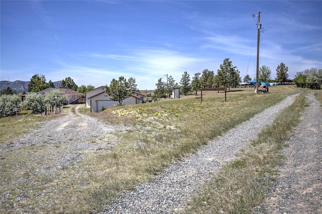 view of road featuring driveway