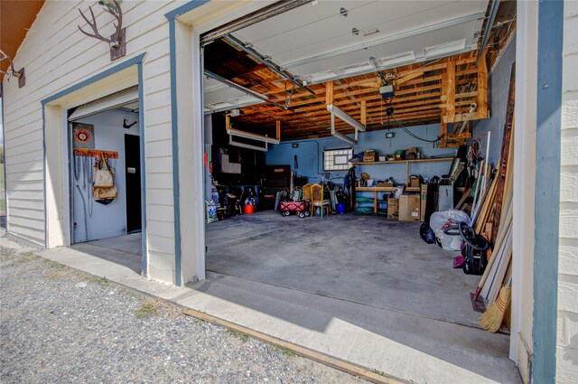 garage featuring a garage door opener