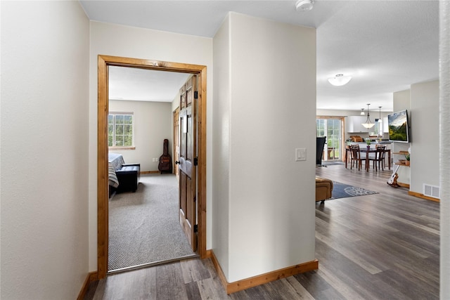 70 Moccasin Ln, Thompson Falls, MT 59873 - corridor featuring baseboards and wood finished floors