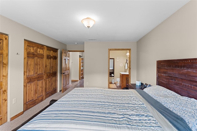 70 Moccasin Ln, Thompson Falls, MT 59873 - bedroom featuring carpet, a closet, and ensuite bathroom