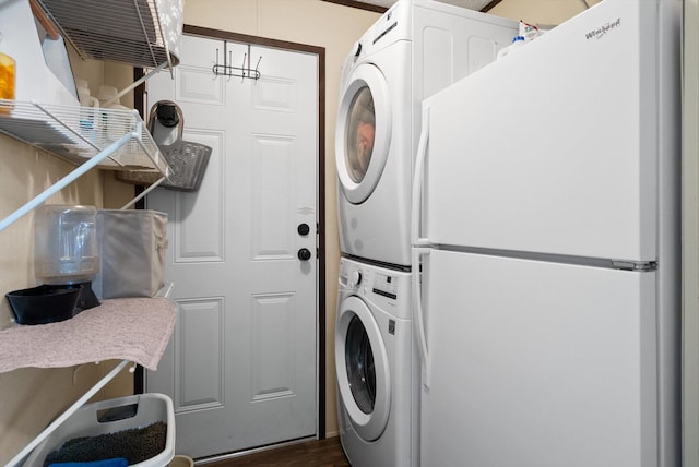 110 Van Sant Rd Unit 4, Kalispell, MT 59901 - laundry area with stacked washer and clothes dryer and dark wood-style floors
