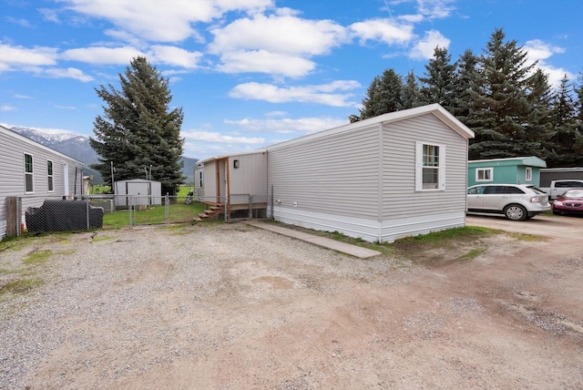 110 Van Sant Rd Unit 4, Kalispell, MT 59901 - view of front of property featuring fence