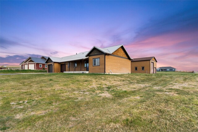 20 Windy Meadow Dr, Townsend, MT 59644 - exterior space with a garage and a front lawn