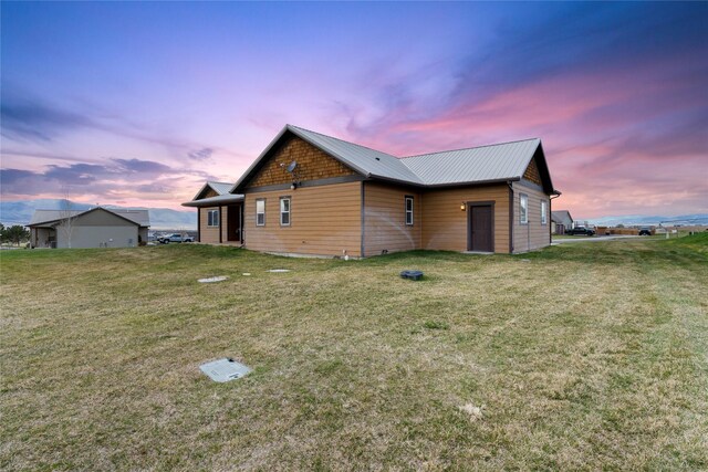 20 Windy Meadow Dr, Townsend, MT 59644 - view of side of home featuring a lawn and metal roof