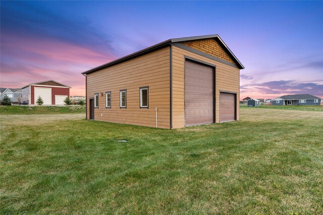 20 Windy Meadow Dr, Townsend, MT 59644 - outdoor structure at dusk with a lawn and an outbuilding