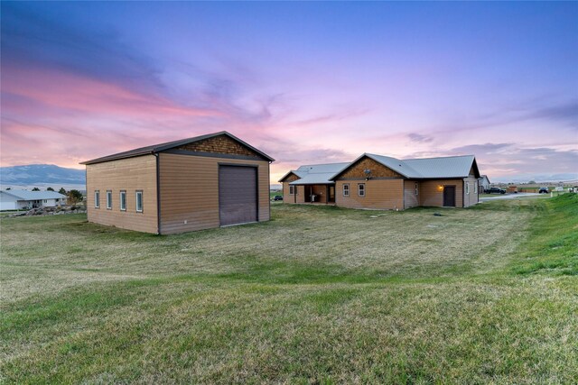 20 Windy Meadow Dr, Townsend, MT 59644 - outdoor structure at dusk with a yard and an outbuilding