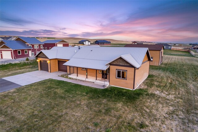 20 Windy Meadow Dr, Townsend, MT 59644 - foyer featuring baseboards, an inviting chandelier, dark wood-style floors, and lofted ceiling