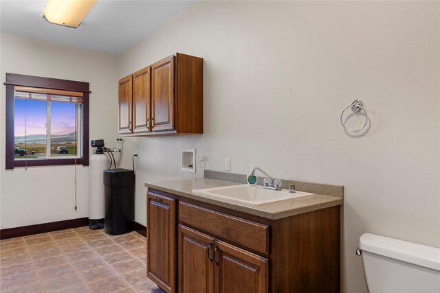 20 Windy Meadow Dr, Townsend, MT 59644 - interior space featuring a sink, baseboards, and hookup for a washing machine