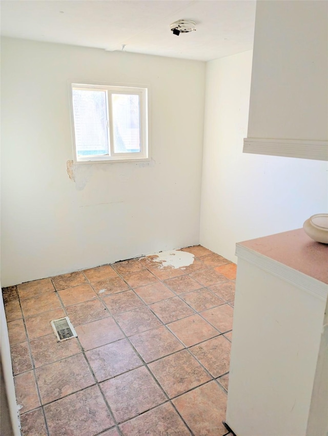 spare room with visible vents