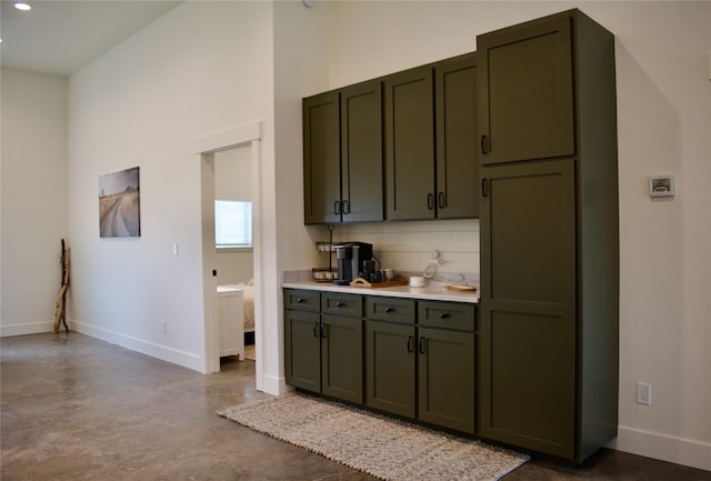 288 Costich Lake Rd, Eureka, MT 59917 - kitchen with light countertops, recessed lighting, baseboards, and finished concrete floors