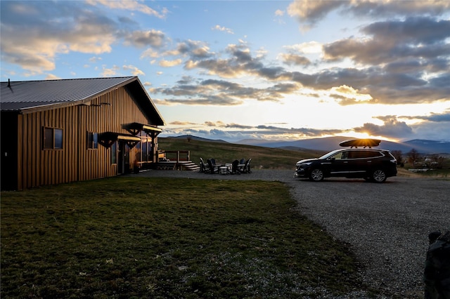 288 Costich Lake Rd, Eureka, MT 59917 - view of yard with a mountain view and an outdoor fire pit