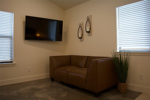 288 Costich Lake Rd, Eureka, MT 59917 - living area featuring baseboards and concrete flooring