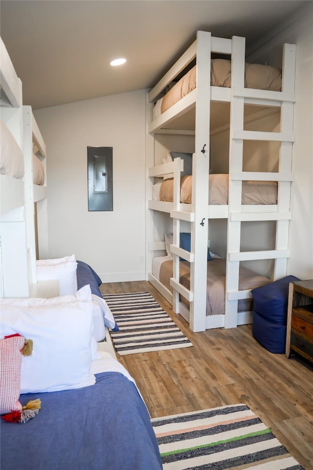288 Costich Lake Rd, Eureka, MT 59917 - bedroom featuring recessed lighting, wood finished floors, and electric panel