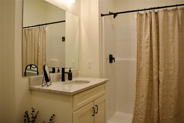 bathroom with vanity and a shower with curtain