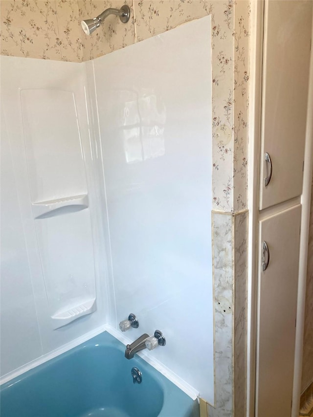 bathroom with shower / bathing tub combination