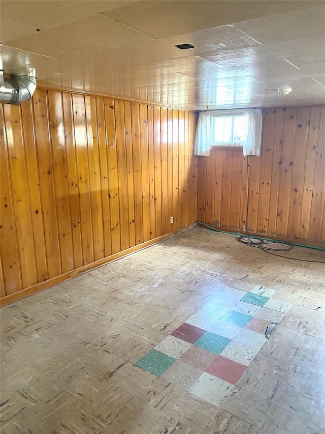 basement with wood walls